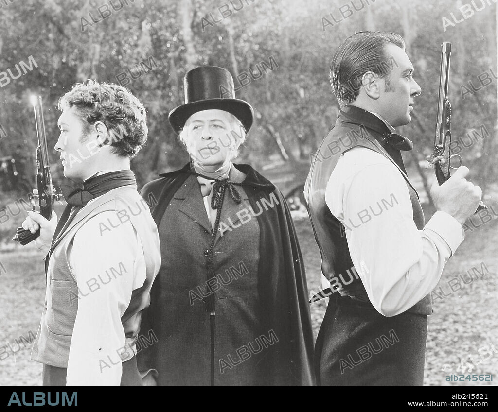 GEORGE BRENT and RICHARD CROMWELL in JEZEBEL, 1938, directed by WILLIAM WYLER. Copyright WARNER BROS/FIRST NATIONAL.