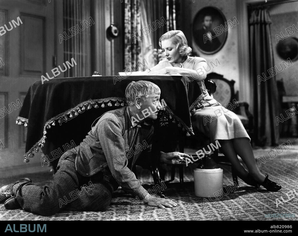 JEAN ARTHUR and VICTOR JORY in PARTY WIRE, 1935, directed by ERLE C. KENTON. Copyright COLUMBIA PICTURES.