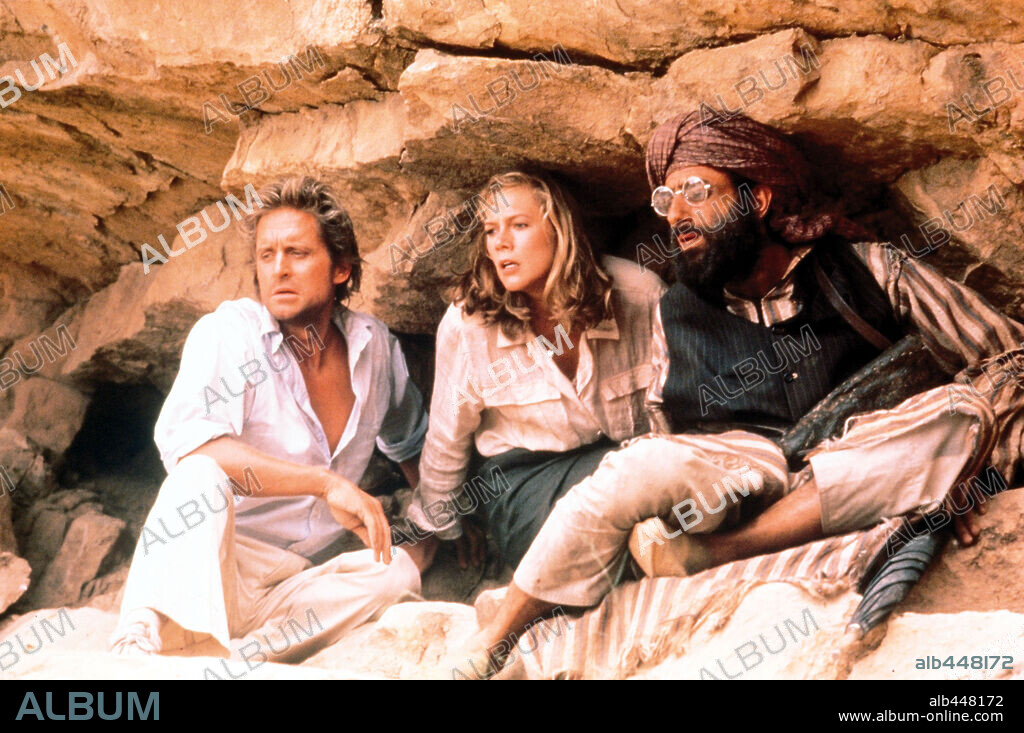 AVNER EISENBERG, KATHLEEN TURNER und MICHAEL DOUGLAS in THE JEWEL OF THE NILE, 1985, unter der Regie von LEWIS TEAGUE. Copyright 20TH CENTURY FOX.