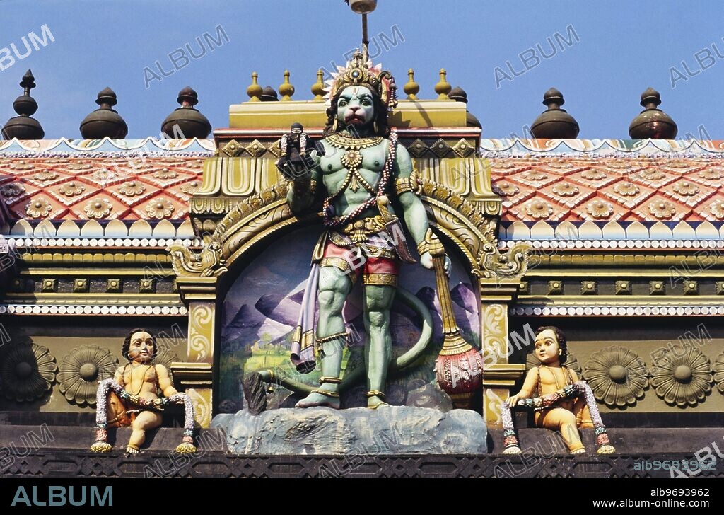 God Hanuman statue on top of temple - Trivandrum - Kerala - India.