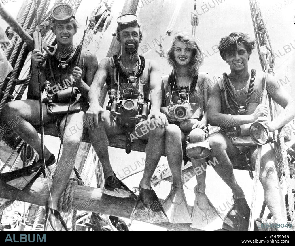 Under The Red Sea. Red Sea adventures Leo Rohrer; Dr. Hans Hass; his secretary, Lottie Berl and Jerry Weidler, on board their headquarters ship, "El Chaora." Their exploits beneath the sea will be seen in Sol Lesser's exciting new adventure film, "Under The Red Sea," for RKO Radio distribution.The diving party which carried out extensive researches under the Red Sea - Leo Rohrer, Dr. Hass, Mrs. Hass, Jerry Weidler - abroad the mother ship. February 25, 1953.