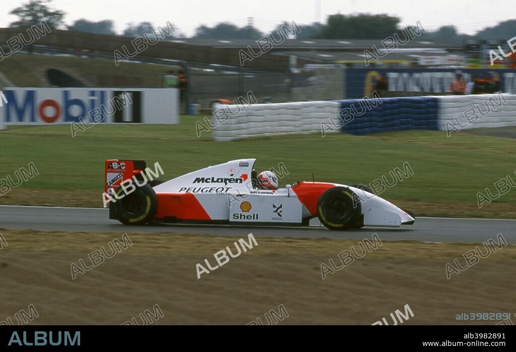 1994 McLaren Peugeot MP4-9 Martin Brundle, tyre testing at Silverstone.