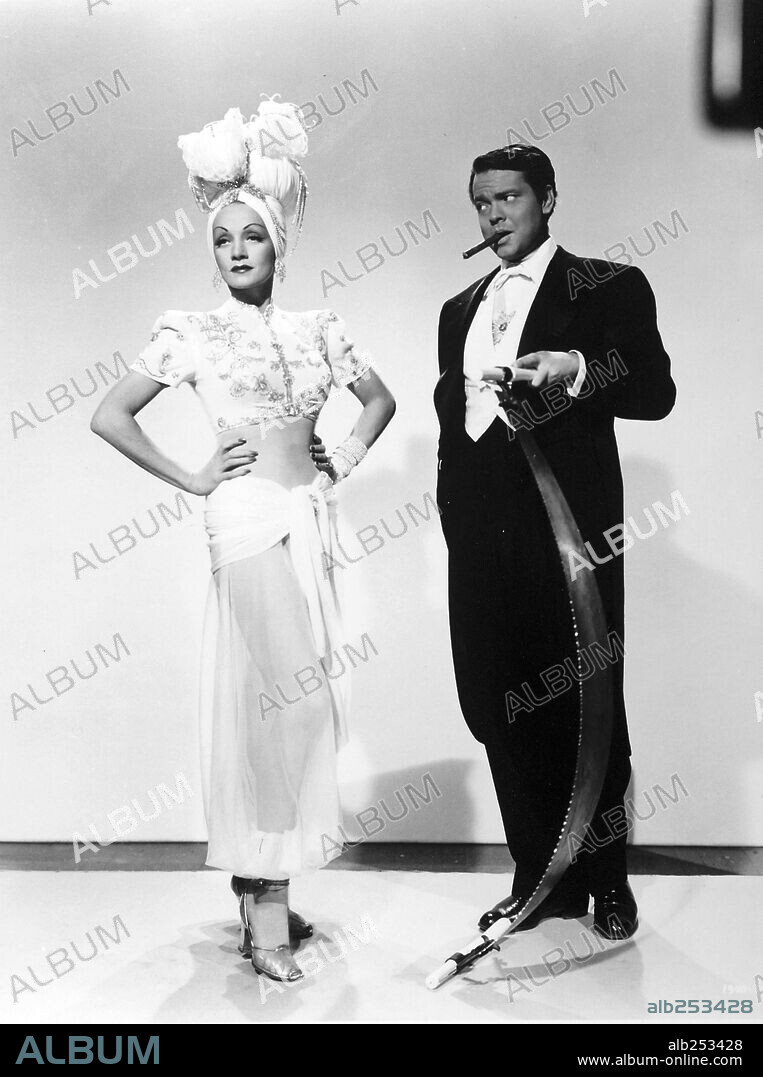 MARLENE DIETRICH and ORSON WELLES in FOLLOW THE BOYS, 1944, directed by A. EDWARD SUTHERLAND. Copyright UNIVERSAL PICTURES.