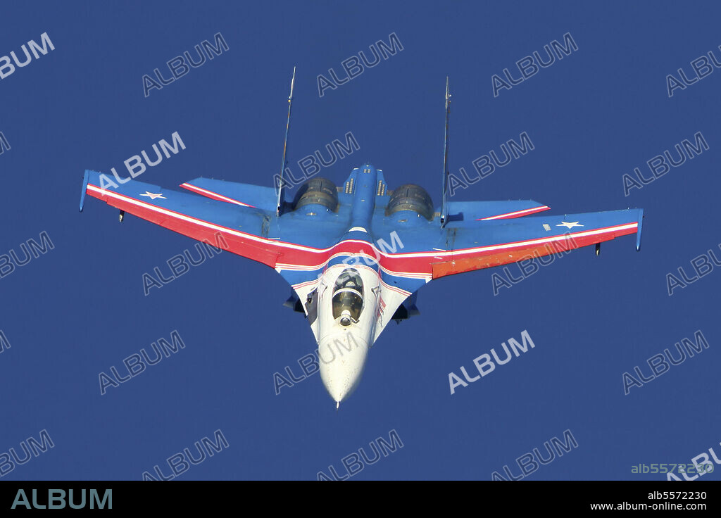 Su-27 jet fighter of Russian Knights aerobatics team performing demonstration flight, Kubinka, Russia.