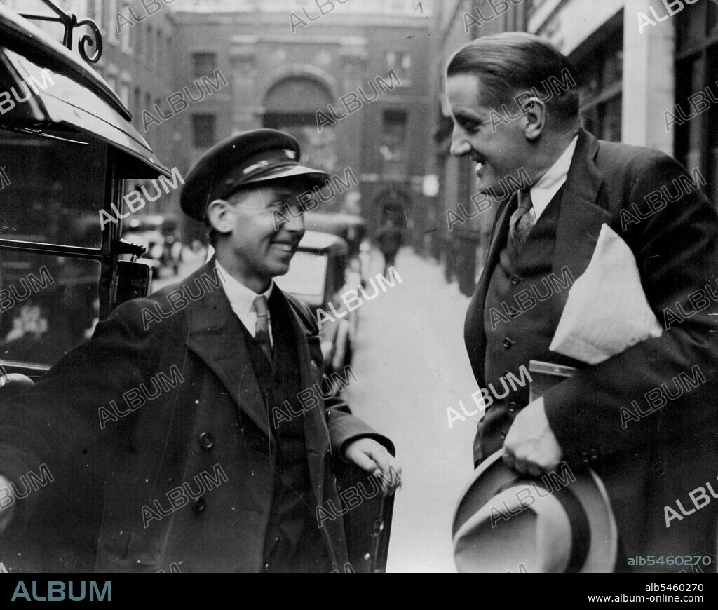 ***** - Hitler's Friend - In London: Dr. Hanfstaengl chatting with a London taxi-driver after leaving his London hotel today.Dr. Ernst ("Putzy") Hanfstaengl, intimate friend of Chancellor Hitler and chief of the Nazi Foreign Press Department, is staying at a London Hotel. Dr. Hanfstaengl outbursts in connection with criticisms in the foreign press of the Nazi regime in Germany. October 28, 1934. (Photo by The Associated Press of Great Britain Ltd.).