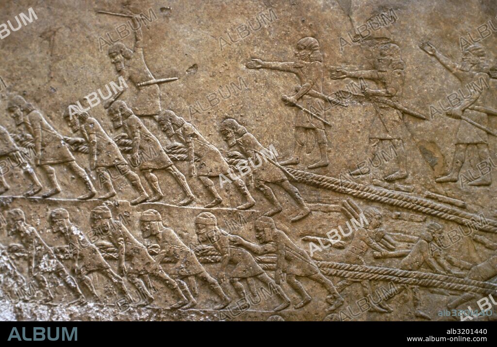 ARTE MESOPOTAMICO-ASIRIO. Prisioneros de guerra reconstruyendo Lakish (Lachish). Relieve procedente del Palacio de Sennacherib o Senaquerib (700-692 a. C.), rey de Asiria. British Museum. Londres. Inglaterra.
