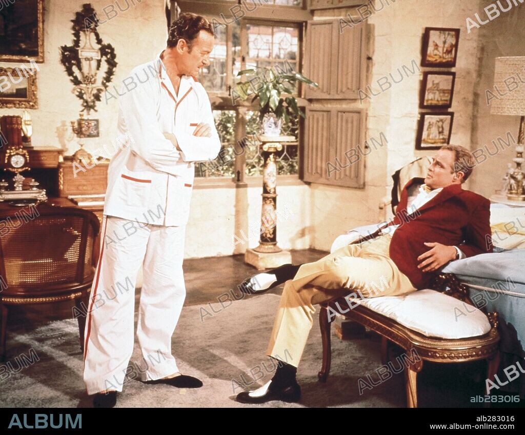 DAVID NIVEN and MARLON BRANDO in BEDTIME STORY, 1964, directed by RALPH LEVY. Copyright UNIVERSAL PICTURES.