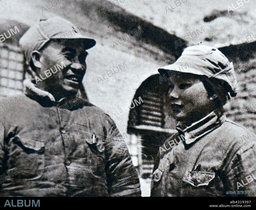 Zhu De (1886 - 6 July 1976), Chinese general, warlord, politician, revolutionary and one of the pioneers of the Communist Party of China. Seen here with his wife, Kang Keqing, in the caves at Yenan during the Long March. Kang Keqing (1911 - 1992), was a politician of the People's Republic of China.