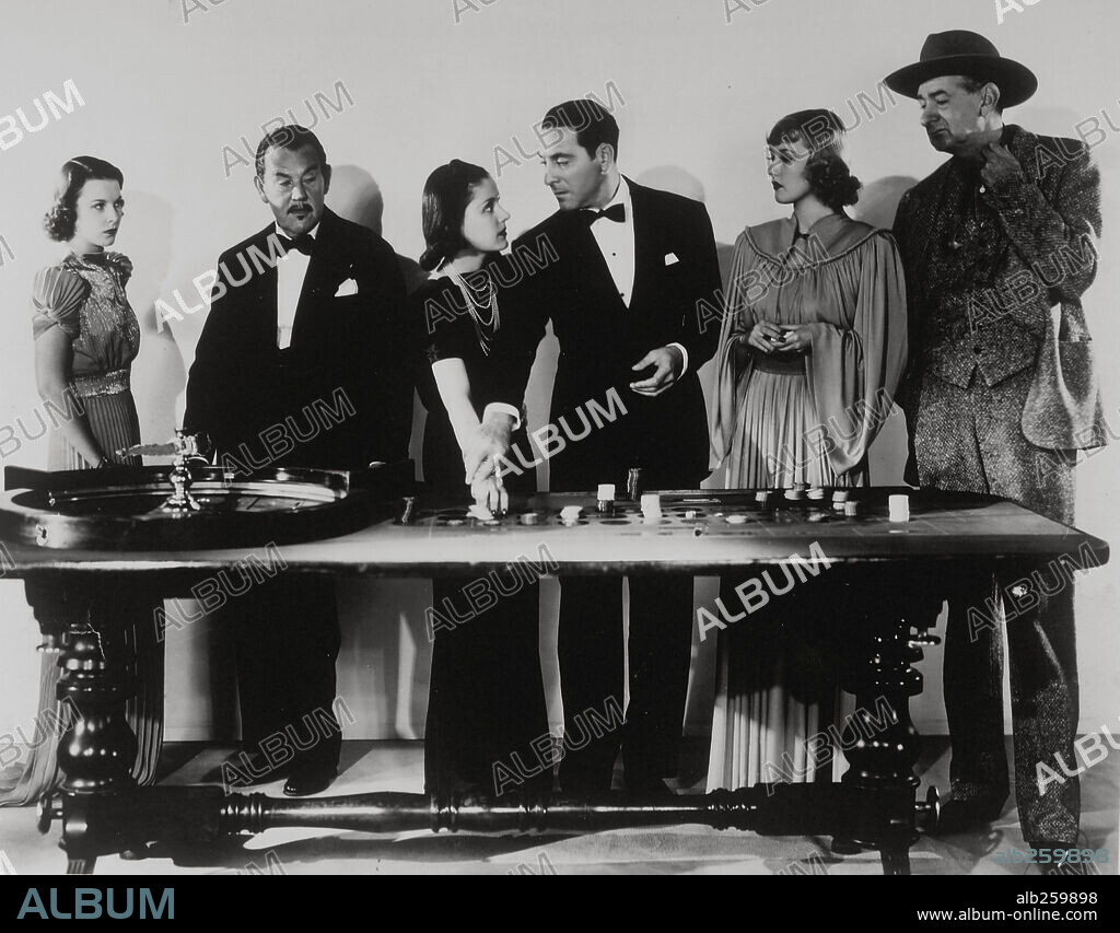 RICARDO CORTEZ y SIDNEY TOLER en CHARLIE CHAN IN RENO, 1939, dirigida por NORMAN FOSTER. Copyright 20TH CENTURY FOX.