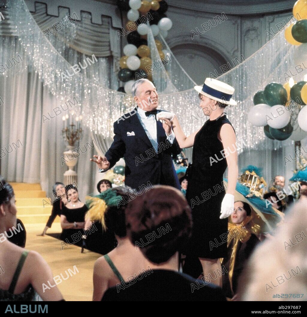 JOANNE WOODWARD and MAURICE CHEVALIER in A NEW KIND OF LOVE, 1963, directed by MELVILLE SHAVELSON. Copyright PARAMOUNT PICTURES.