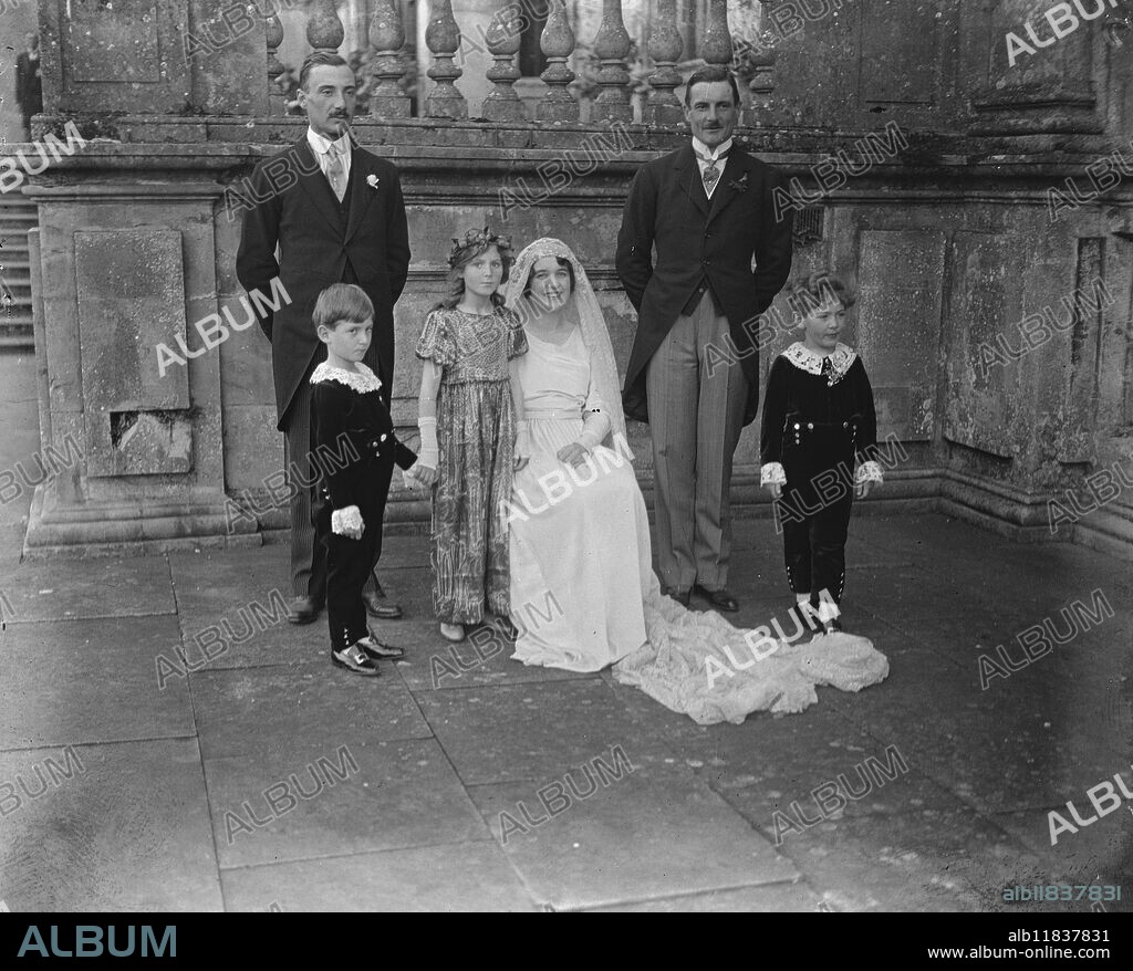 The wedding took place at Horningsham Church , near Warminster , between Lady Emma Thynne , and the Marquis of Northampton . The Bride and Bridegroom with the three little trainbearers and the Best Man . 15 October 1921.