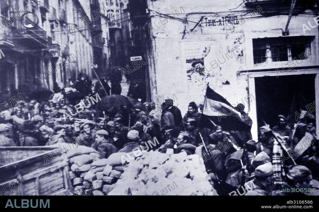 Entry of nationalist forces to the city of Teruel, during the Spanish Civil War. The combatants fought the battle between December 1937 and February 1938, during the worst Spanish winter in twenty years. The battle was one of the bloodier actions of the war with the city changing hands several times, first falling to the Republicans and eventually being re-taken by the Nationalists. In the course of the fighting, Teruel was subjected to heavy artillery and aerial bombardment. The two sides suffered over 140,000 casualties between them in the two-month battle.