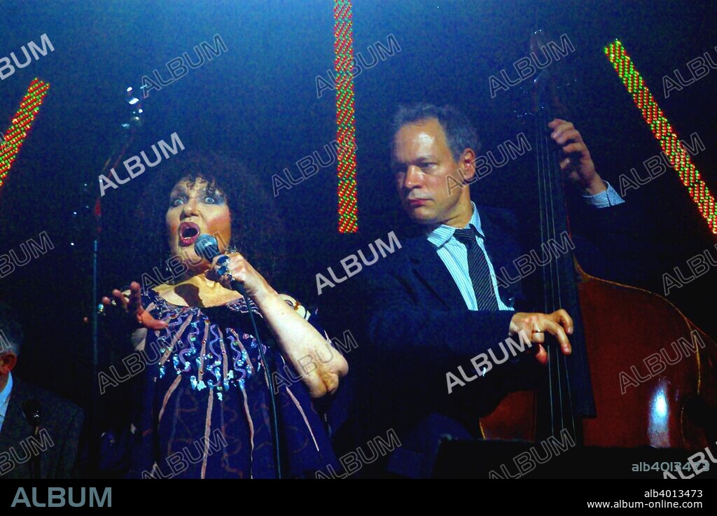 Alec Dankworth, jazz bassist and composer with his mother, Dame Cleo Laine, jazz singer and actress, at Brecon Jazz Festival, Powys, Wales. Alec Dankworth's father is the late Sir John Dankworth, jazz composer, saxophonist and clarinetist.
