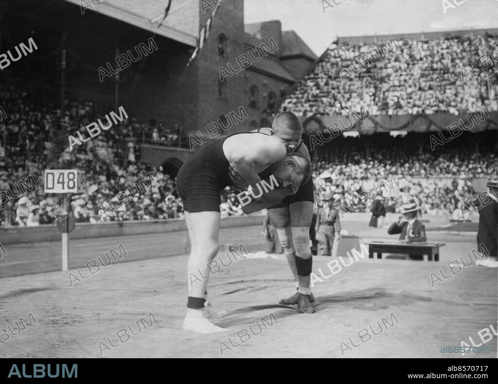 STOCKHOLM 1912-07-10. Anders Ahlgren wrestling for 9 hours against Ivar Böhling, Finland, during the Olympic Games in Stockholm. Toilet breaks included. The match was interrupted every half hour.. Wrestling at the Olympics in Stockholm 1912.. Foto: Pressen Bild / SCANPIX / Kod 194.