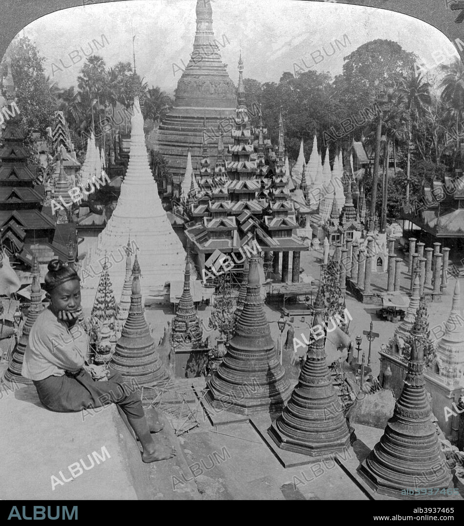 Shwedagon Pagoda, Rangoon, Burma, c1900s(?). Stereoscopic card. Buddhist tradition holds that the Shwedagon Pagoda was built before the Buddha died in 486 BC, but archaeologists believe its construction dates from between the 6th and 10th century. The height of the stupa was increased on several occasions, reaching its current 98 metres (320 feet) in the 18th century.