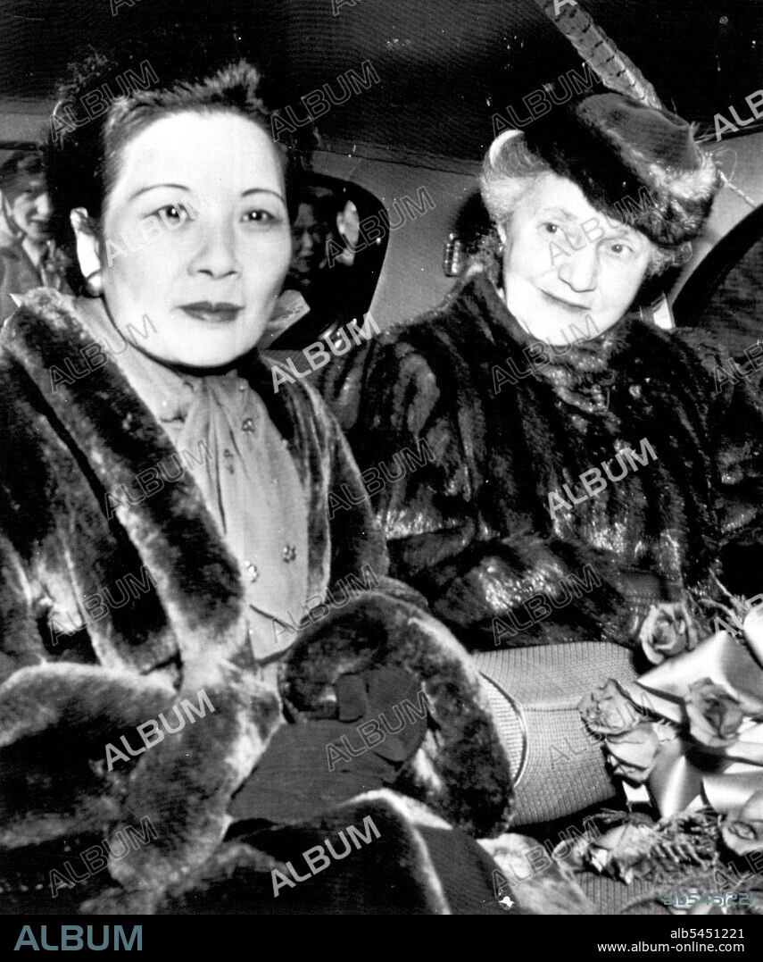 Madame Chiang In Washington -- Madame Chiang Kai-stek (left), first Lady of China,l and Mrs. George C. Marshall, wife of the secretary of state, prepare to leave Washington National Airport today after Madame Chiangs arrival here by plane. December 01, 1948. (Photo by AP Wirephoto).
