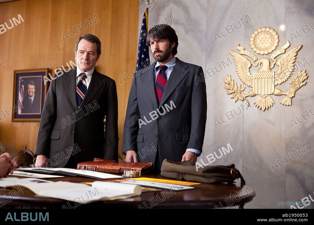 BEN AFFLECK and BRYAN CRANSTON in ARGO, 2012, directed by BEN AFFLECK. Copyright WARNER BROS. PICTURES.