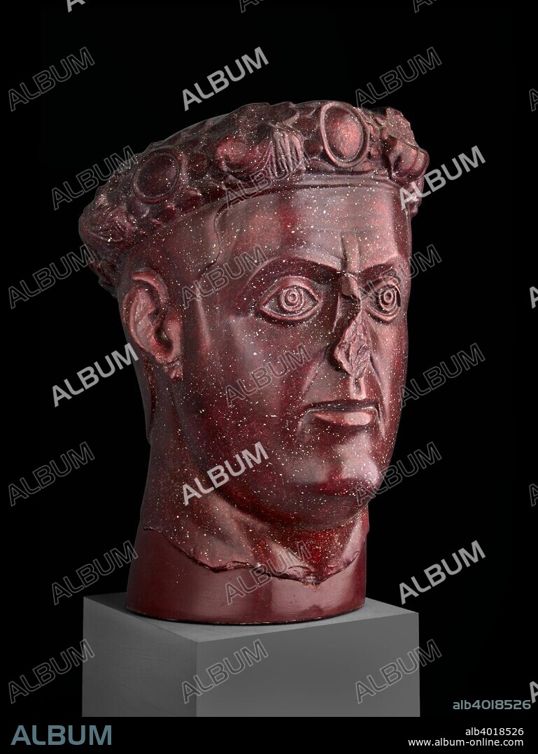 Head of Tetrarch, probably Galerius, from Gamzigrad, c310. The head wears a laurel wreath, decorated with gems and busts. A hand from a Victory (now lost) holds the wreath at the back.  Dimensions: height: 35 cm.