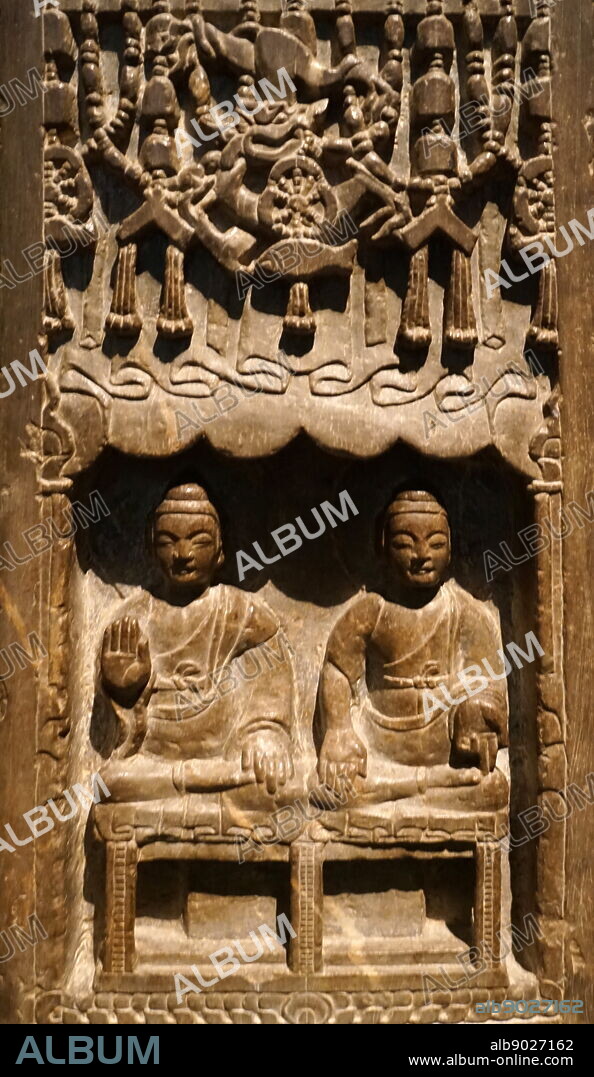 Votive stele of a Chinese Buddhist in limestone from the Northern Qi Dynasty. Dated 6th Century.