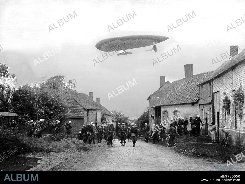 September 1910. Military Maneuvers in France. The Airship "Clement Bayard" Passing over a Small Town to recognize the situation of the Troops. Photo: Harlingue.