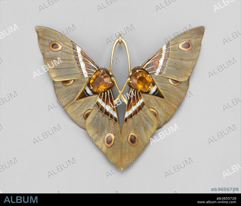RENÉ LALIQUE. "Moth" Pendant. Designer: Lucien Gaillard (French, Paris 1861-1942 Paris). Dimensions: H. 3, W. 3-5/8 in.  (7.6 x 9.2 cm). Date: ca. 1900.
Lucien Gaillard was the son and grandson of Parisian jewelers, as well as the brother of the noted Art Nouveau furniture designer Eugène Gaillard.  After Lucien took over the family firm in 1892, the emphasis switched to metalworking, frequently inspired by Japanese prototypes.  Around the turn of the century, with the encouragement of his friend René Lalique, Gaillard turned back to jewelry.  His designs, like many by Lalique, incorporated unusual materials such as horn and ivory combined with more traditional precious stones, gold and enamel.  The insect motif of this brooch is typical of the period.