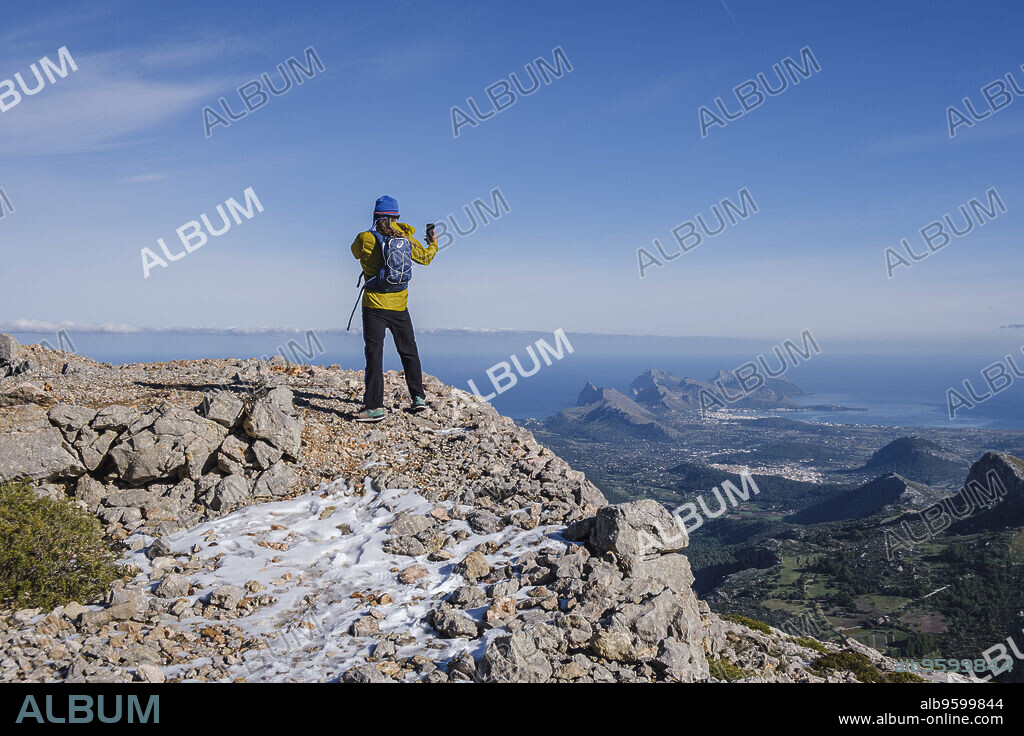 Casa de Neu del Puig Tomir, Alcudia bay in the background, Mallorca, Balearic Islands, Spain.