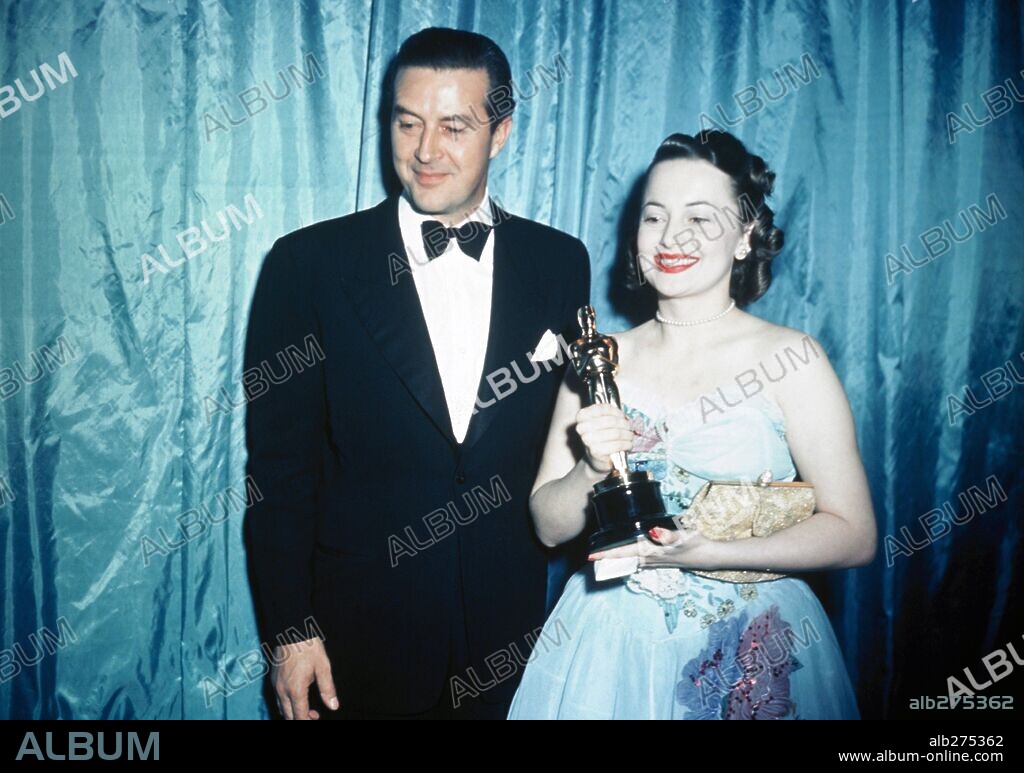 OLIVIA DE HAVILLAND y RAY MILLAND. 19ª Edición de los Premios Oscar / 1947. 
Olivia de Havilland, premiada como mejor actriz por "Vida íntima de Julia Norris", junto a Ray Milland. 1947