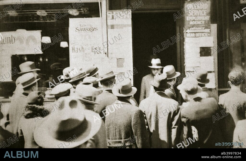 Employment office, on Sixth Avenue near Forty-third Street, New York, USA, early 1930s. Looking for work during the Great Depression.