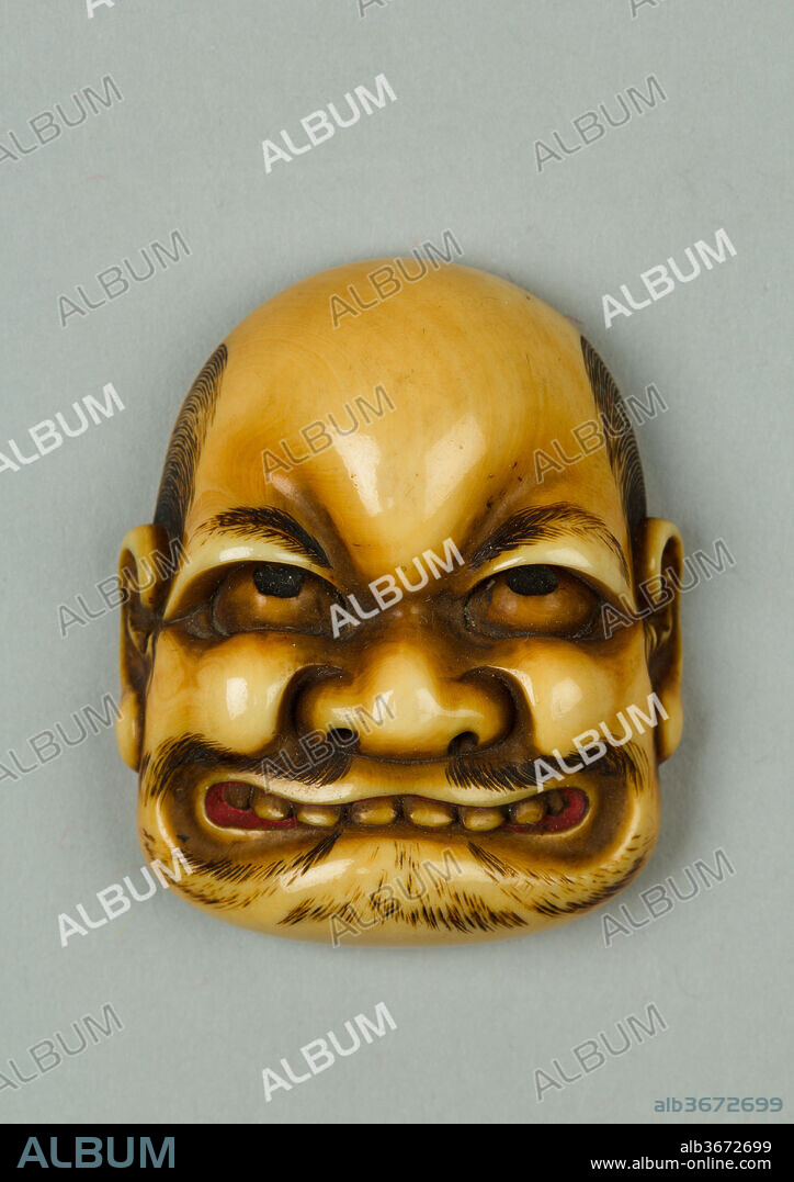 Netsuke of Mask of a Man. Culture: Japan. Dimensions: H. 1 5/8 in. (4.1 cm); W. 1 3/8 in. (3.5 cm). Date: 19th century.