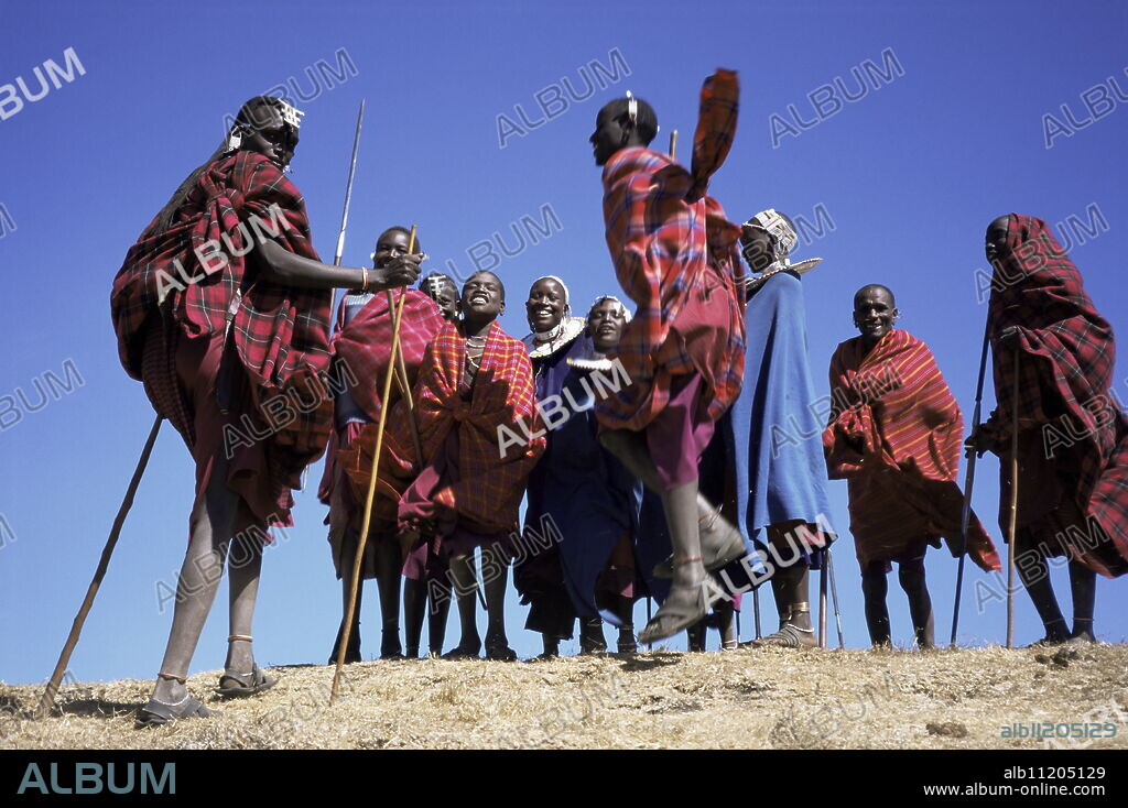 Masai warriors performing jumping dance, Serengeti Park, Tanzania, East Africa, Africa.