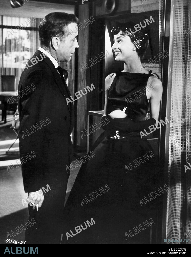AUDREY HEPBURN y HUMPHREY BOGART en SABRINA, 1954, dirigida por BILLY WILDER. Copyright PARAMOUNT PICTURES.