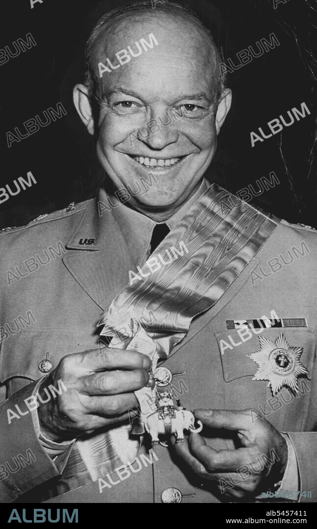 "Ike" Wears An Elephant -- Following presentation ceremonies tonight, Gen. Dwight D. Eisenhower exhibits an elephant - but it had nothing to do with the Republican party. It came in the form of Denmark's highest decoration, the Order of Knight of the Elephant, awarded to the U.S. Chief of Staff at a Danish Embassy Dinner. Embassy officials said the diamond encrusted medal, one of the oldest decorations in the world, is awarded only to princes of blood. October 29, 1947. (Photo by Associated Press Wirephoto).