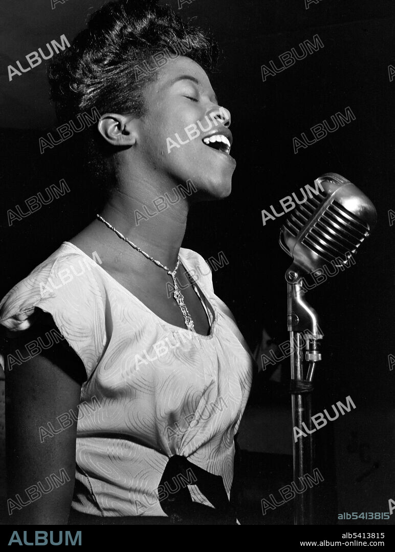 Portrait of Sarah Vaughan, Café Society (Downtown), New York, N.Y., ca. Aug. 1946. Vaughan (1924-1990) was an American jazz singer. Nicknamed "Sassy" and "The Divine One," she won four Grammy Awards, including the Lifetime Achievement Award. She was given an NEA Jazz Masters Award in 1989.