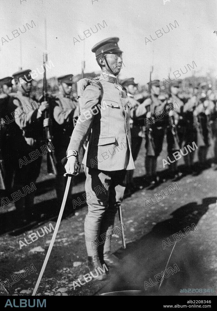 Prince Chichibu in front of troops and holding his sword out, Prince Chichibu (Yasuhito) of Japan, GCVO (??? ?? Chichibu no miya Yasuhito Shinno?, 25 June 1902 - 4 January 1953), also known as Prince Yasuhito, was the second son of Emperor Taisho and a younger brother of the Emperor Showa. As a member of the Japanese imperial family, he was the patron of several sporting, medical, and international exchange organizations.