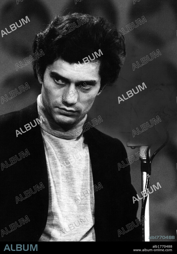 Luigi Tenco at Sanremo festival. The Italian singer Luigi Tenco singing at Sanremo festival. Sanremo, January 1967.