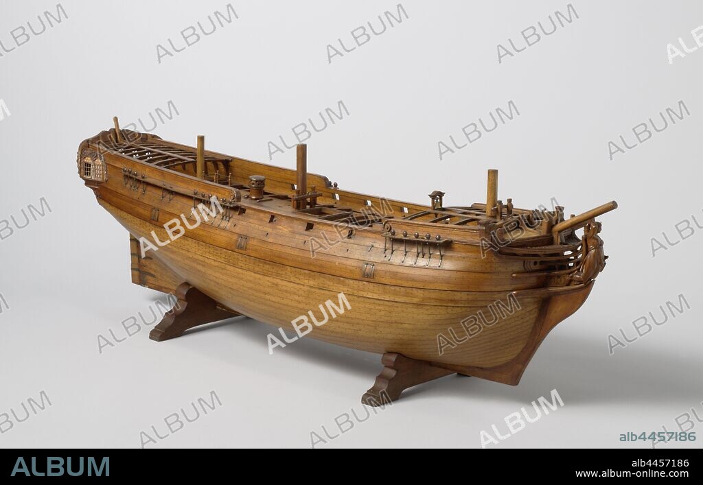 Model of an East Indiaman, Truss model of the trunk of an East Indian sailor, the model can be dismantled in two layers. Eighteen gun ports spread over two decks. Three levels: lower deck, intermediate deck, box deck and half deck, all just deck beams, the floor of the cabin has been lowered, the half deck is very short. The figurehead represents Diana with a dog. Twisted mirror with a port on port, hollow wulf with two gates, fence of a floor with carvings of praises, mythological corner figures and the weapons of Amsterdam and the Chamber of the VOC in Amsterdam, side galleries of a floor with loftwork. Straight rudder with square rudder king. On the tank a servant and the ship's bell, on the main deck a double anchor bet, a servant, a capstan and a ramp. The model is equipped with all the rest with the damsel blocks, the great rest and the peace of mind continue. The smooth-edged skin has been omitted on the port side under the barkwood. The sheer rises to both ends, two barwoods and a deer. Round bilge. The spars are sawn off just above deck, ship model, Amsterdam, Dutch East India Company, anonymous, c. 1740 - c. 1750, wood (plant material), brass (alloy), model: h 43.3 cm × l 134 cm × w 35 cm packaging capsule: h 63.5 cm × w 155.5 cm × d 45.5 cm.