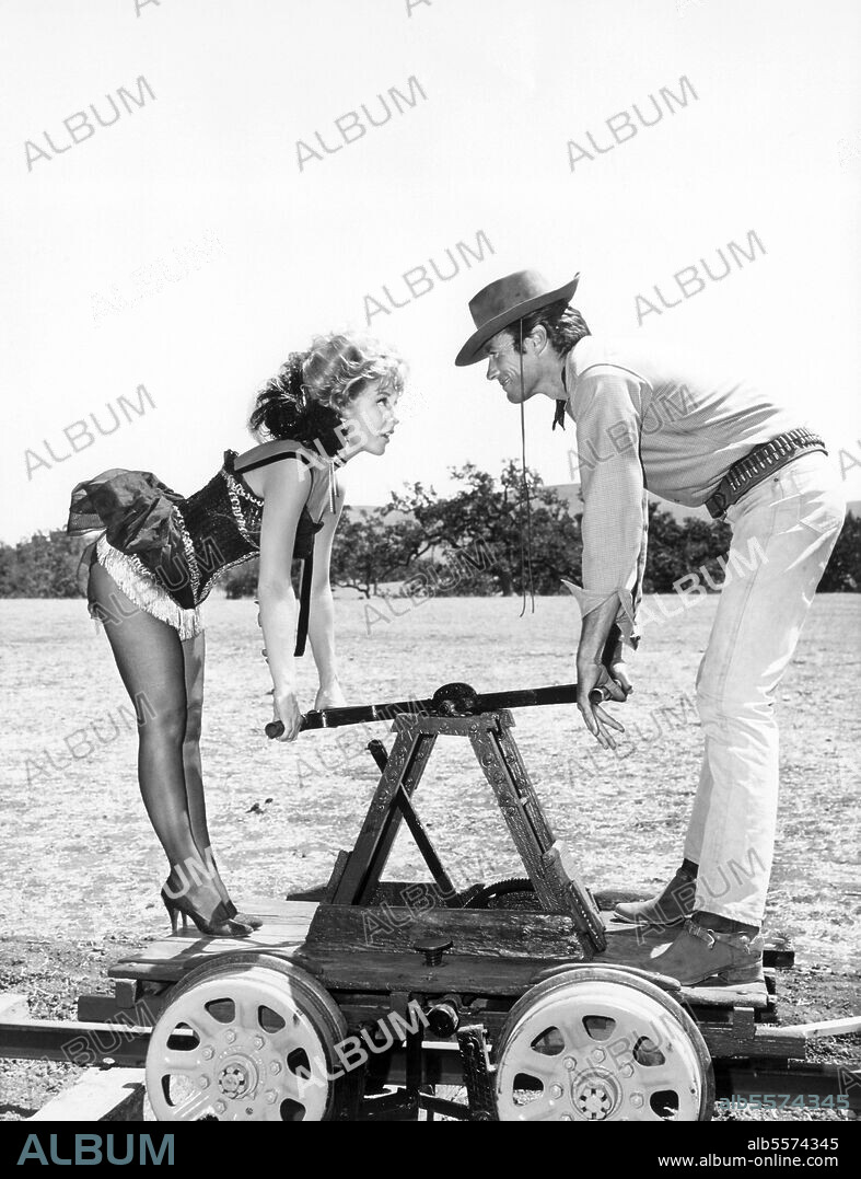 BARBARA EDEN and CLINT EASTWOOD in RAWHIDE, 1959, directed by CHRISTIAN NYBY, HARMON JONES, JESSE HIBBS, TED POST and THOMAS CARR. Copyright M.G.M TELEVISION/CBS TELEVISION.