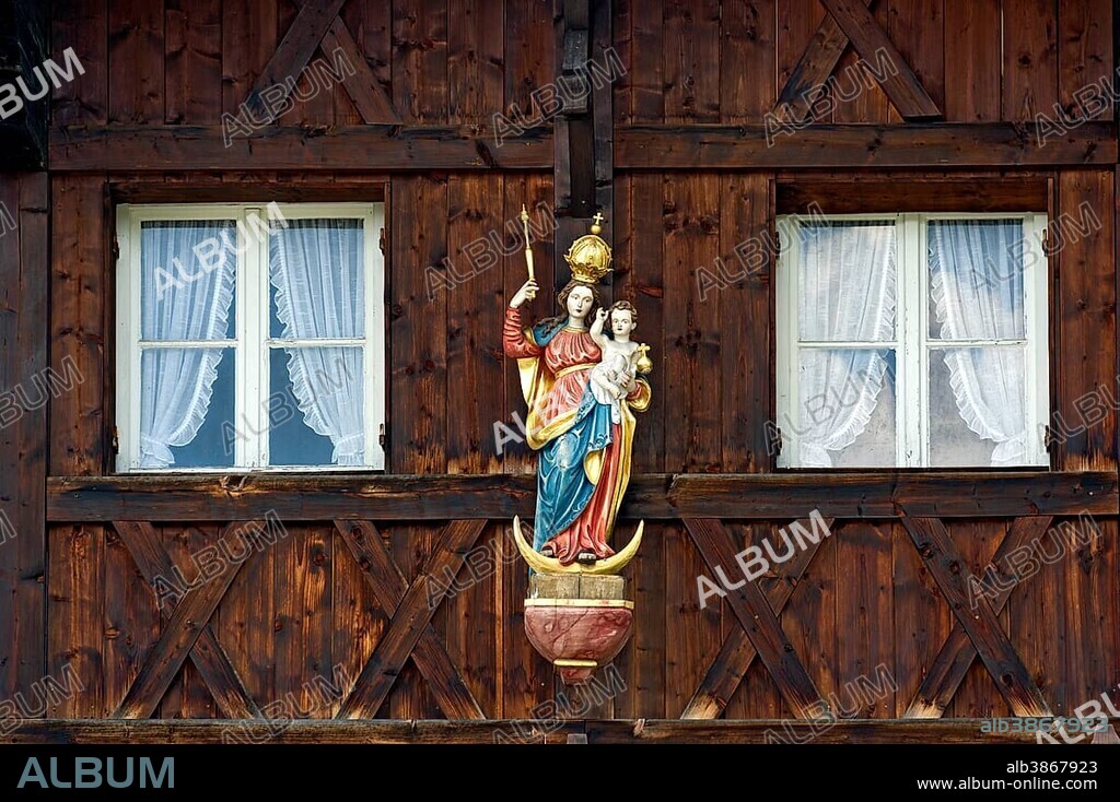 Madonna on an Upper Bavarian wooden house, alpine village Ammertal at Echelsbach, Upper Bavaria, Bavaria, Germany, Europe.