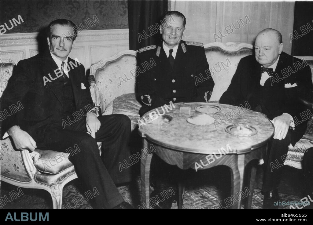 ©SCANPIX SWEDEN, 1953-03-19.. Tito, Churchill och Eden på ambassadlunch i London.. Jugoslaviens president marskalk Josip Broz Tito (mitten),med premiärminister Winston Churchill (t.h.) och utrikesminister Anthony Eden fotograferade på jugoslaviska ambassaden i Kensington, London.. Foto: Scanpix. Code: 20360.