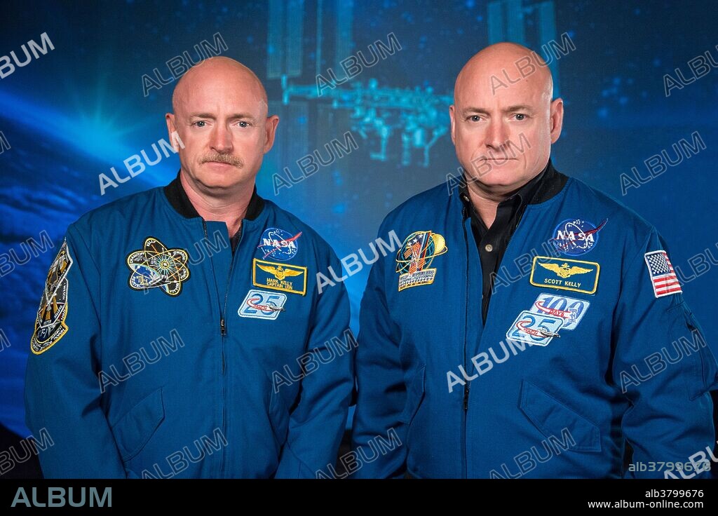 NASA Expedition 45/46 Commander, Astronaut Scott Kelly along with his brother, former Astronaut Mark Kelly at the Johnson Space Center, Houston Texas, 2015. Mark and Scott Kelly are identical twins, and will be studied for changes in their health, comparing a body in space to a body on earth. Scott Joseph Kelly (born February 21, 1964) is an American astronaut, engineer and a retired U.S. Navy Captain. A veteran of three previous missions, Kelly was selected along with Mikhail Korniyenko in November 2012 for a special year-long mission to the International Space Station. Kelly commanded the International Space Station (ISS) on Expedition 26. Kelly's identical twin brother, Mark Kelly, is a former astronaut. The Kelly brothers are the only siblings to have traveled in space. Mark Edward Kelly (born February 21, 1964) is a retired American astronaut, engineer and U.S. Navy Captain. He is the husband of former Congresswoman Gabrielle Giffords, an author, a political activist, and an aerospace executive and consultant.