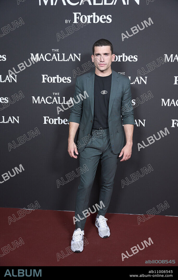 Jaime Lorente attends 'Las Joyas de The Macallan by Forbes' red carpet at Malborough Gallery on March 21, 2024 in Madrid, Spain.