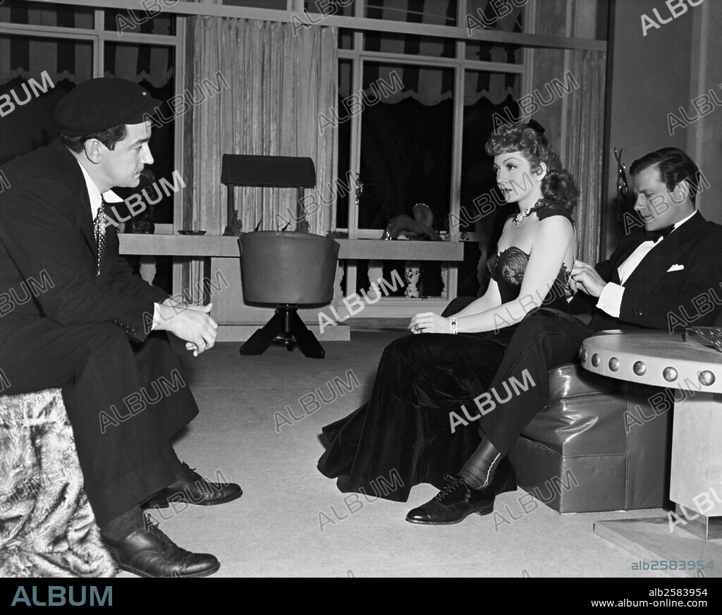 CLAUDETTE COLBERT and JOEL MCCREA in THE PALM BEACH STORY, 1942, directed by PRESTON STURGES. Copyright PARAMOUNT PICTURES.