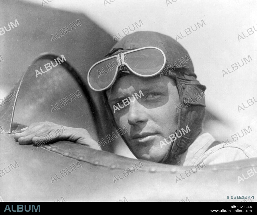 Lindbergh, wearing helmet with goggles up, in open cockpit of airplane at Lambert Field, St. Louis, Missouri. Circa 1923-28. Charles Augustus Lindbergh (February 4, 1902 - August 26, 1974) was an American aviator, author, inventor, and social activist. He gained world fame for his solo non-stop flight on May 20-21, 1927, from Roosevelt Field, Long Island to Le Bourget Field in Paris, nearly 3,600 statute miles, in the single-seat, single-engine purpose built Ryan monoplane Spirit of St. Louis. He was awarded the Medal of Honor for his historic exploit. Lindbergh used his fame to promote the development of commercial aviation and Air Mail services in the US and the Americas. In 1932, his son, Charles, Jr., was kidnapped and murdered in what was dubbed the "Crime of the Century". The Lindbergh family went into voluntary exile in Europe in 1935 and did not return to the US until 1939. In his later years, he became a prolific prize-winning author, international explorer, inventor, and environmentalist. Lindbergh spent his final years on Maui, where he died of lymphoma in 1974 at age 72.