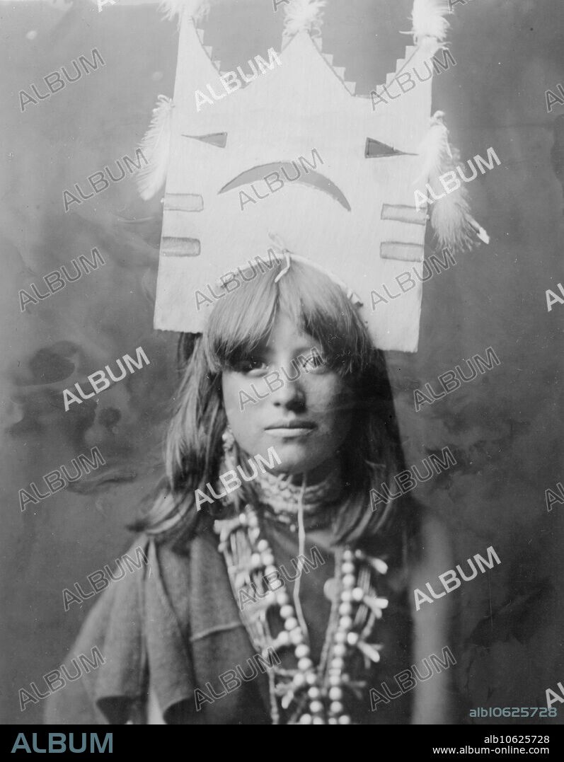 EDWARD SHERIFF CURTIS. Tablita woman dancer-San Ildefonso, c1905. Head-and-shoulders portrait of woman with elaborate tablita headdress on crown of her head, facing front.