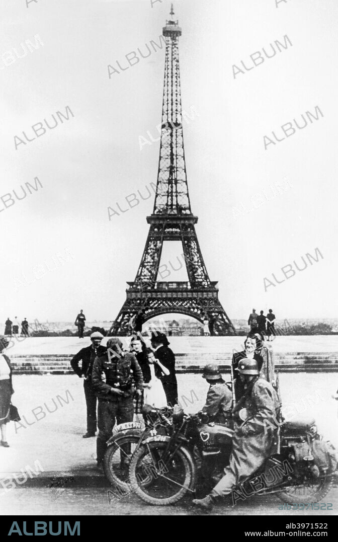 German soldiers in front of the Eiffel Tower, Paris, 1940. Paris fell to the Germans on 14 June 1940.