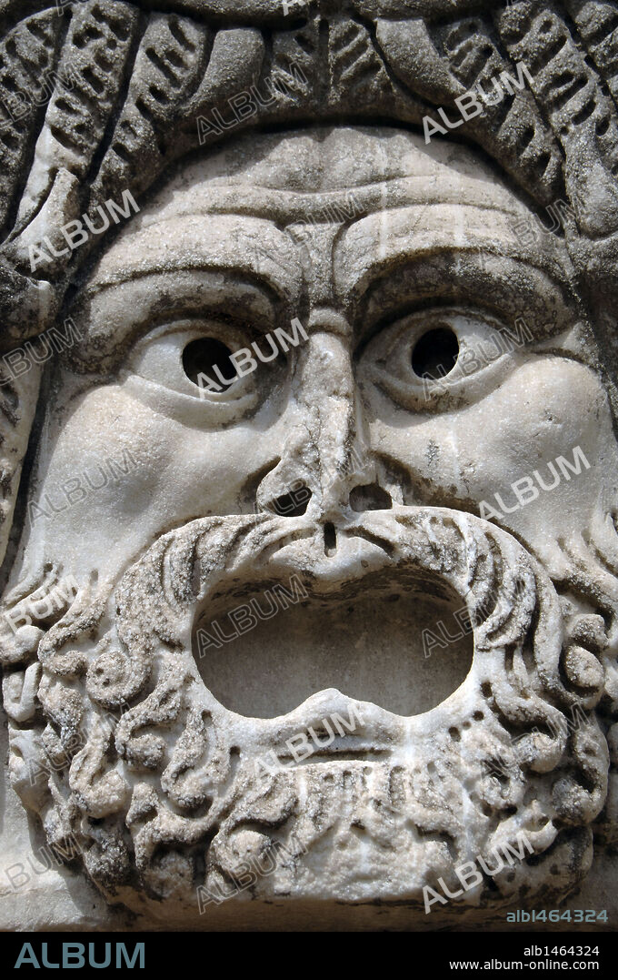 Ostia Antica. Roman theatrical mask on the stage of the Theatre. Marble. 1st - 2nd centuries BC. Italy.