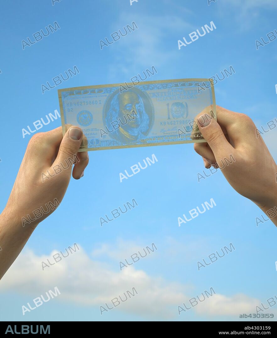 Hands holding transparent one hundred dollar bill up to sky.