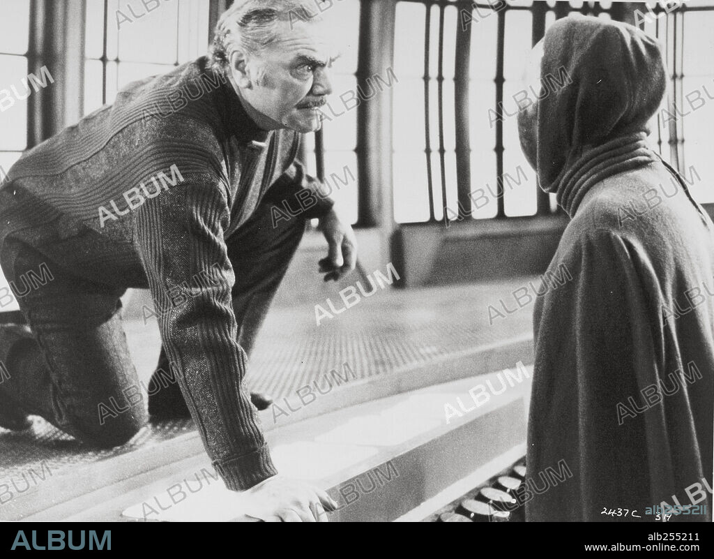 ERNEST BORGNINE in THE BLACK HOLE, 1979, directed by GARY NELSON. Copyright WALT DISNEY PRODUCTIONS.