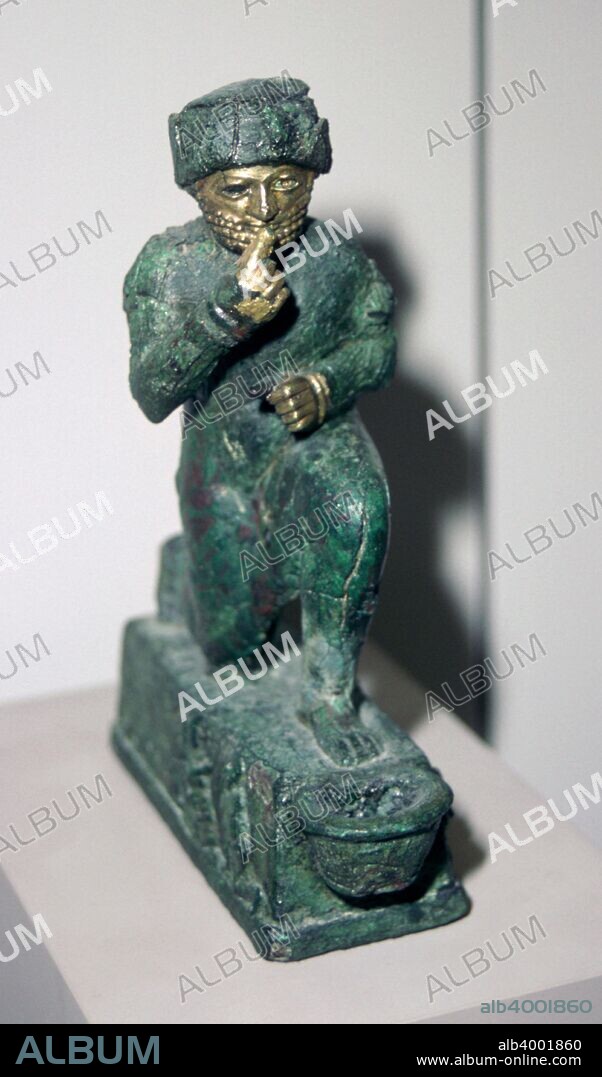 Statuette of a Babylonian worshipper, possibly Hammurabi, dedicated to the God Amurru. It is made of bronze and silver with golden hands. From the Louvre's collection.