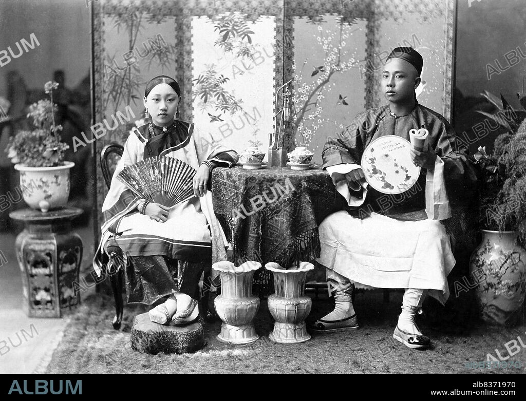 Chinese communities had existed for many centuries in rural Burma and were largely formed by migrants travelling overland from China into Burma along the north-eastern trade routes and rivers.<br/><br/>. The urban Chinese population of cities such as Rangoon (Yangon) originated largely during the colonial era when Chinese from the coastal provinces of China came by sea to work as merchants, among other professions.<br/><br/>. This photograph was most probably taken in Rangoon as it was the location of the firms studio. In 1891 the Imperial Gazetteer of India estimated the Chinese colony in Rangoon as approximately 8,000 people, and this had increased to more than 11,000 by 1901.
